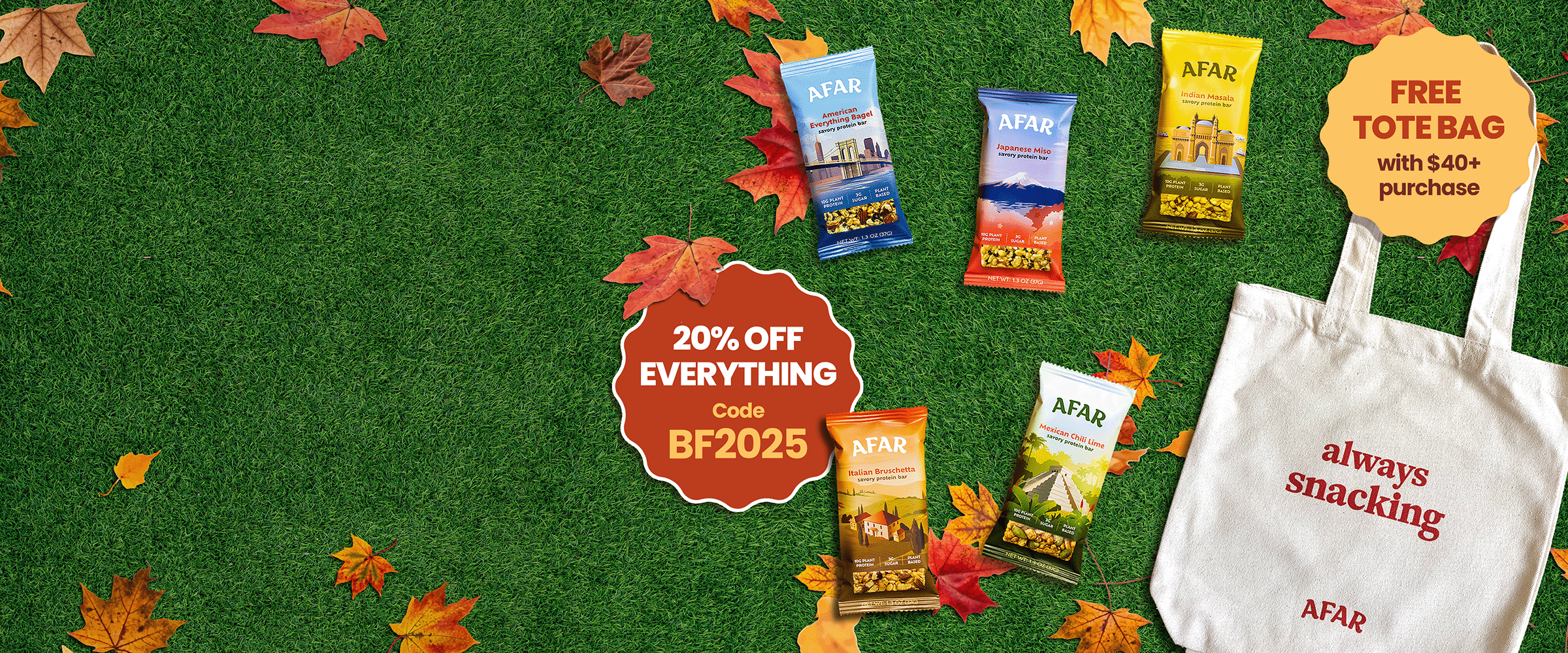 Five AFAR savory protein bar packages and tote bag on grass