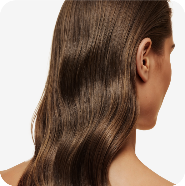 A person with long, smooth brown hair viewed from the side.