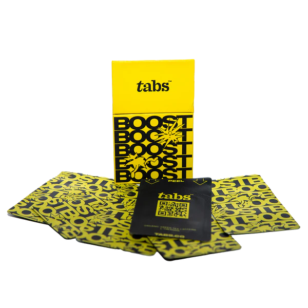 Yellow and black packaging with 'tabs' and 'BOOST' text, featuring a QR code.