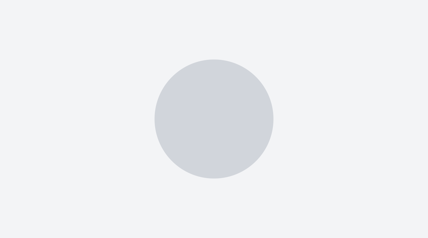 A gray circle placeholder image on a light gray background.