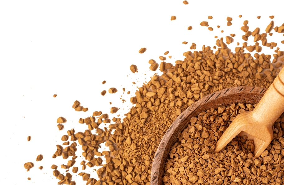 A close-up of instant coffee granules in a wooden bowl with a small wooden scoop, against a white background.