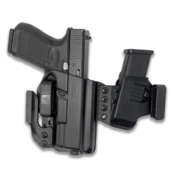 A black pistol shown inside a black holster with an attached spare magazine pouch.
