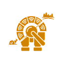 An orange icon of a large wheel, with a deer to the left and trees to the right.