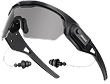 A pair of black wraparound safety glasses with attached earplugs on a white cord against a white background.