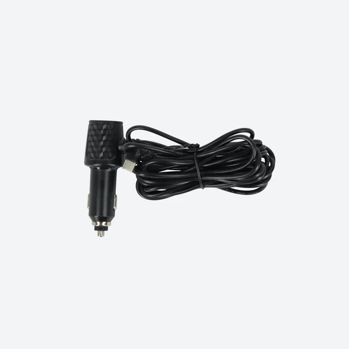 A coiled black car charger with a power plug on a plain background.