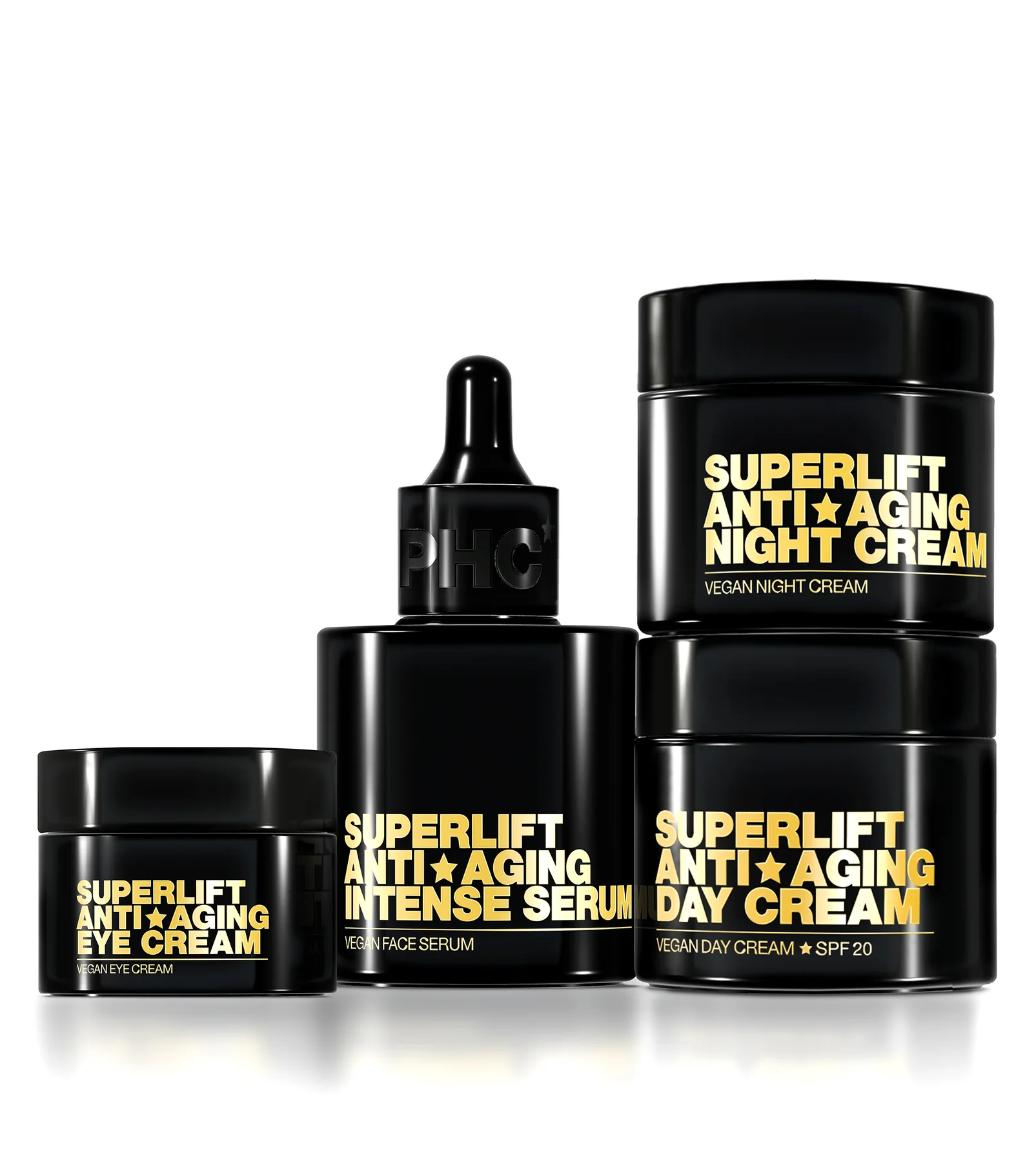 Black containers of anti-aging skincare products with gold text labels.