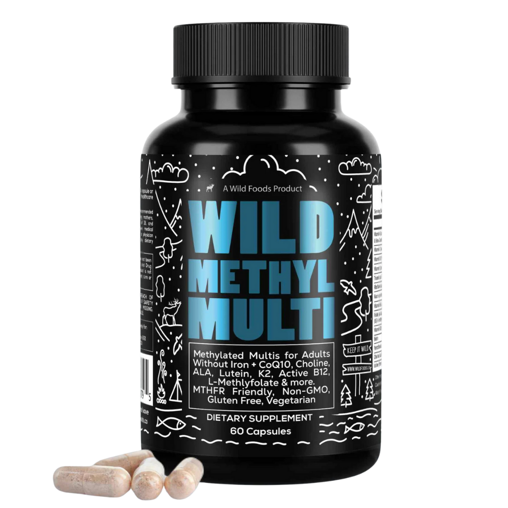 Black bottle labeled 'Wild Methyl Multi' with some scattered capsules beside it.