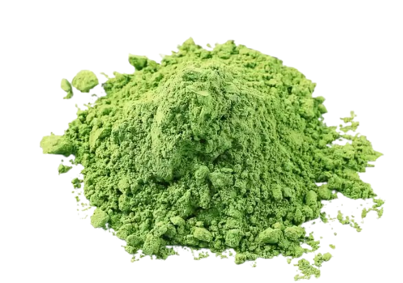 A pile of bright green powder on a white background.