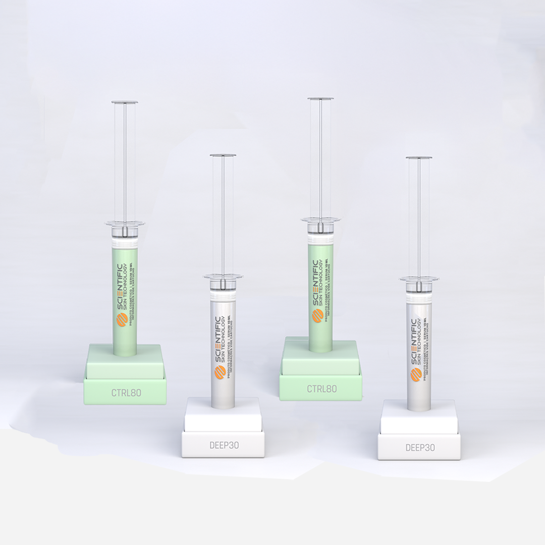 Two syringes with pink liquid, labeled 'Scientific Skin Technology' on square stands labeled 'Lift10'.