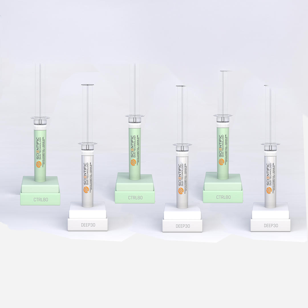 Four pink cosmetic syringe tubes on stand labeled 'LIFT10' against a white background.