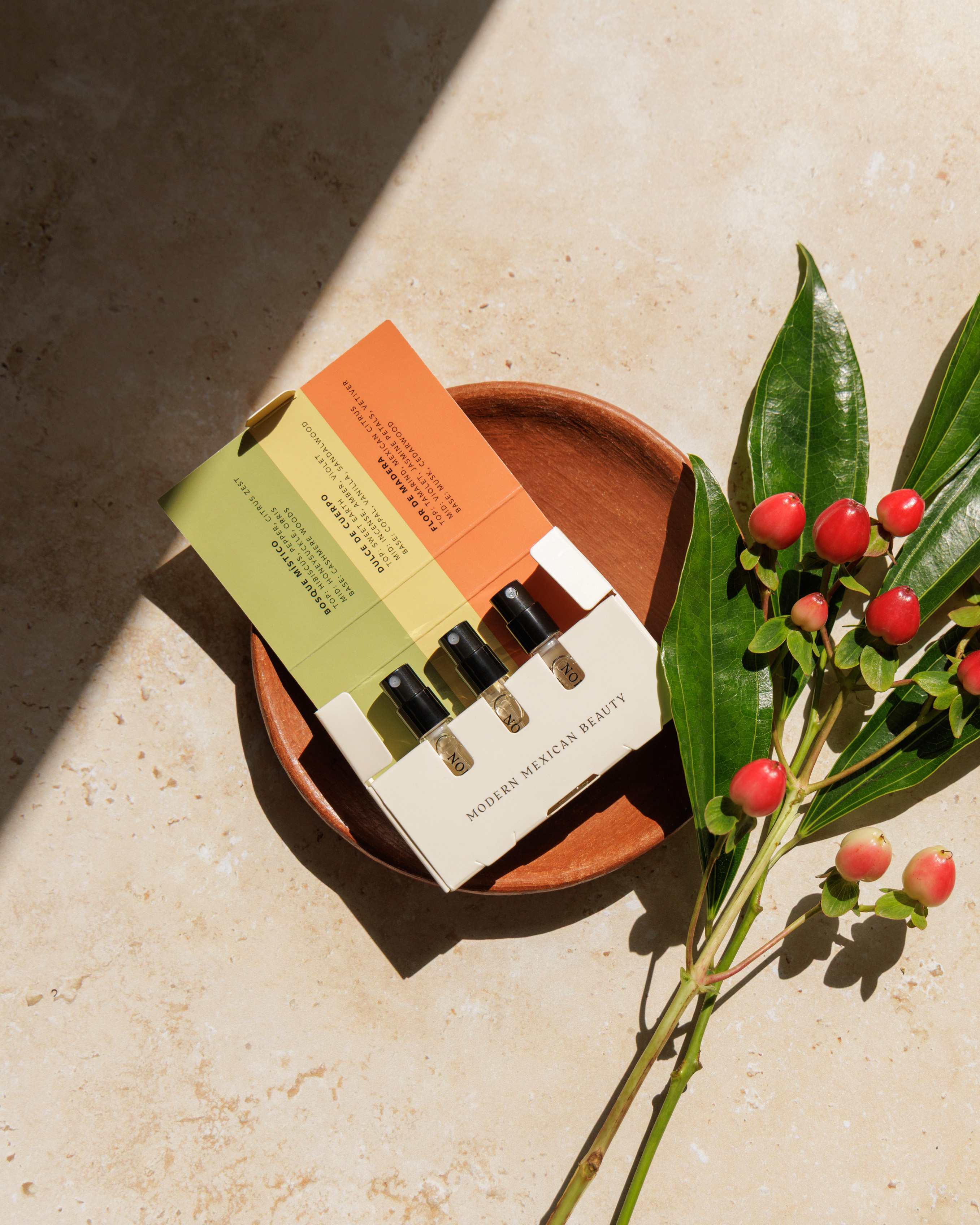 Nopalera fragrance discovery set with botanicals on a tray