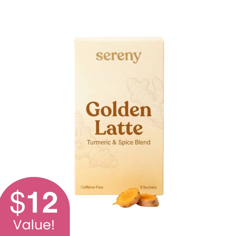 A box of Sereny Golden Latte Turmeric & Spice Blend with two slices of turmeric root in front.
