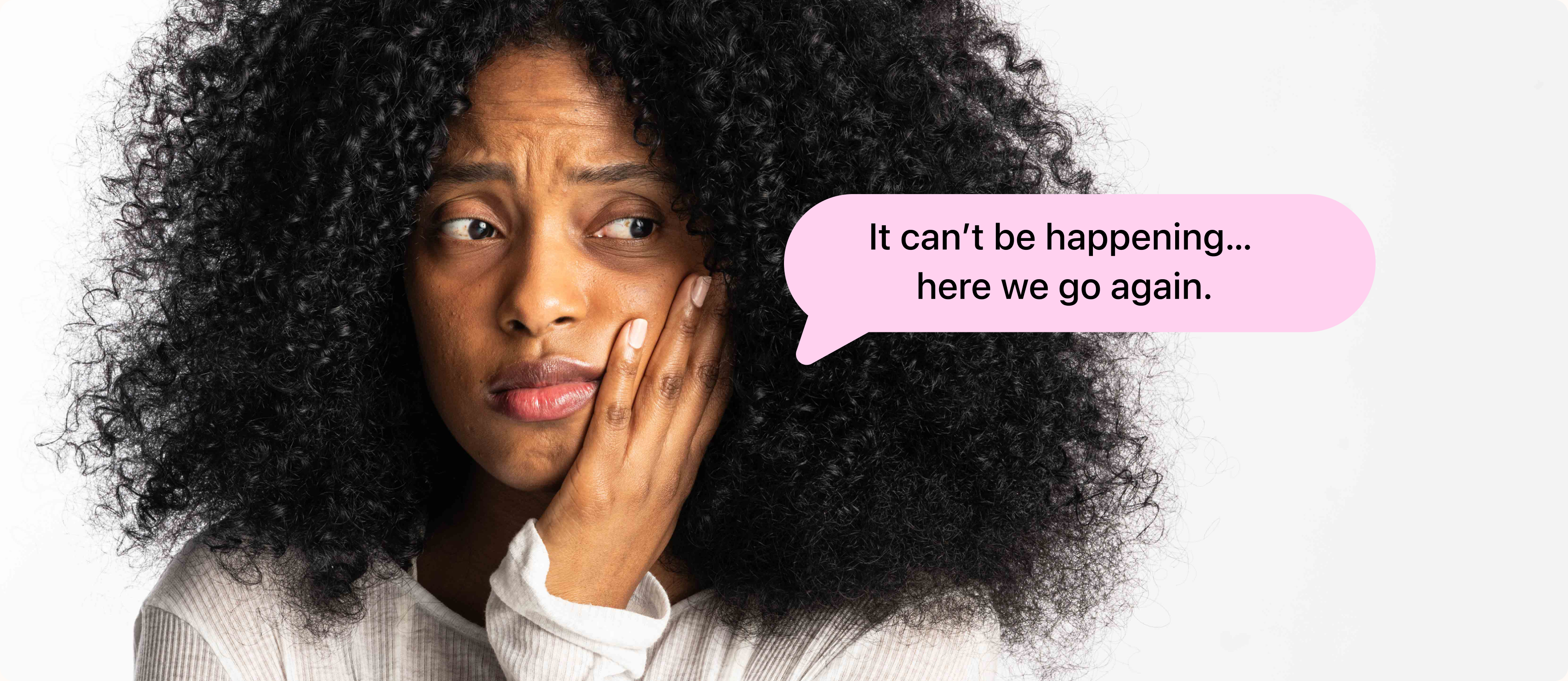 Young woman with long dark hair looking thoughtful, representing women affected by vaginal health issues