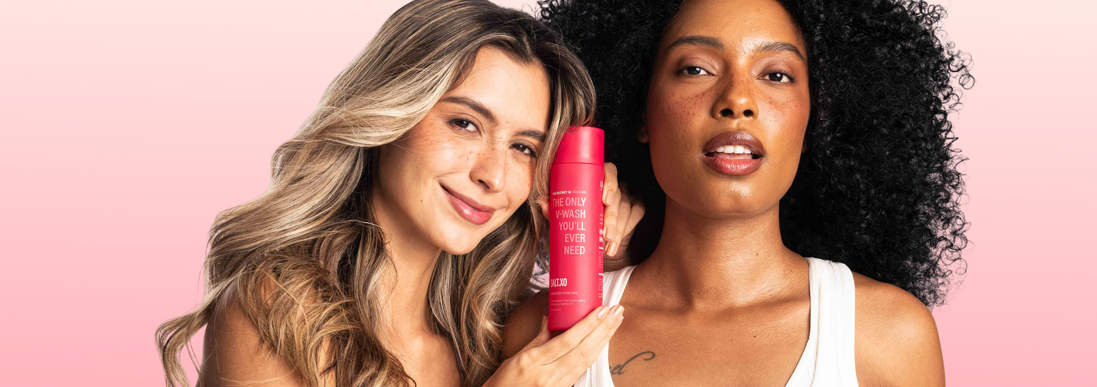 Two women holding Salt.xo V-wash bottle over a million sold