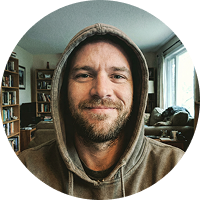 A gray placeholder icon of a person's head and shoulders inside a circle.