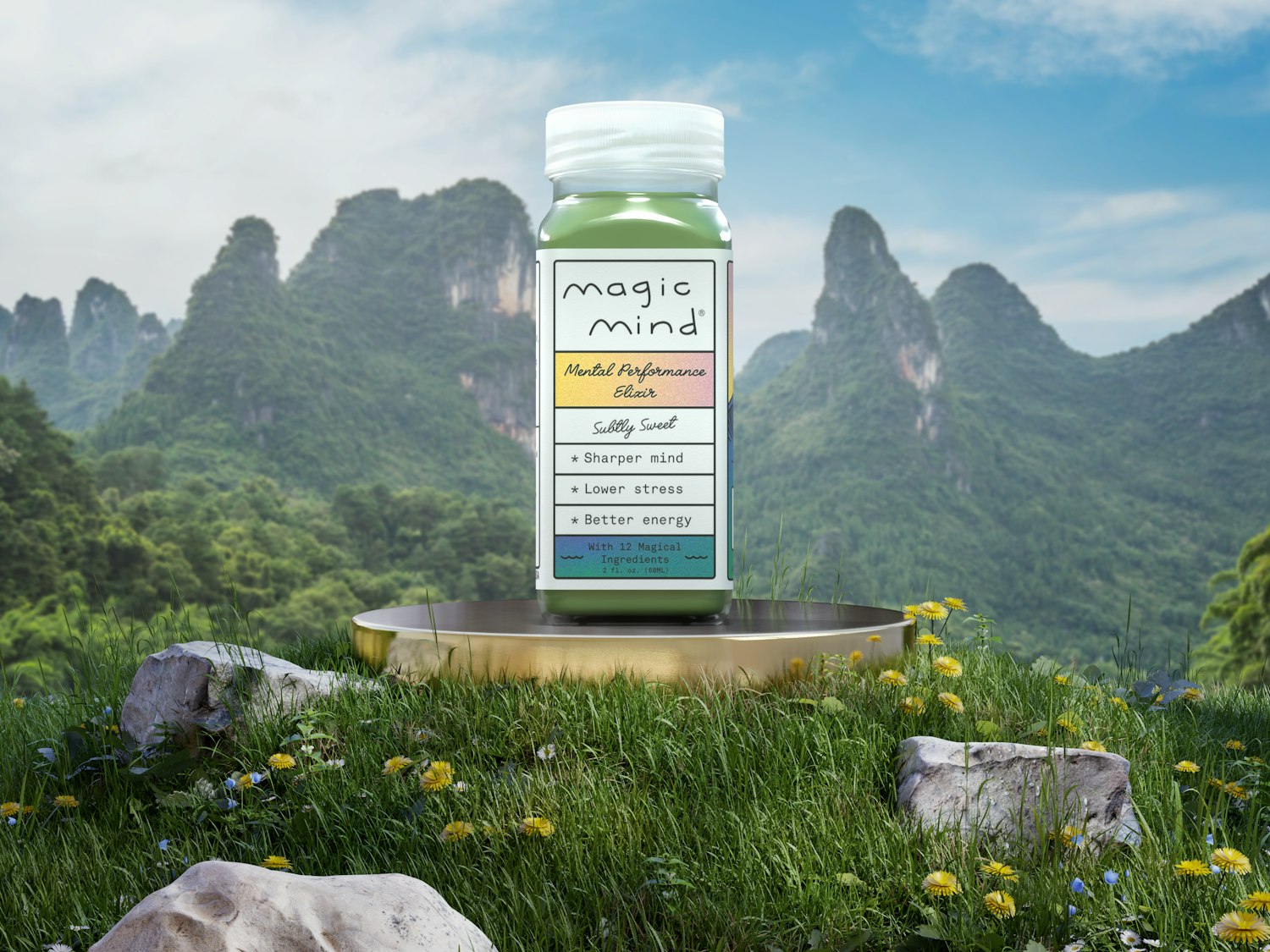 A bottle labeled 'Magic Mind' on grassy field with a mountainous background.
