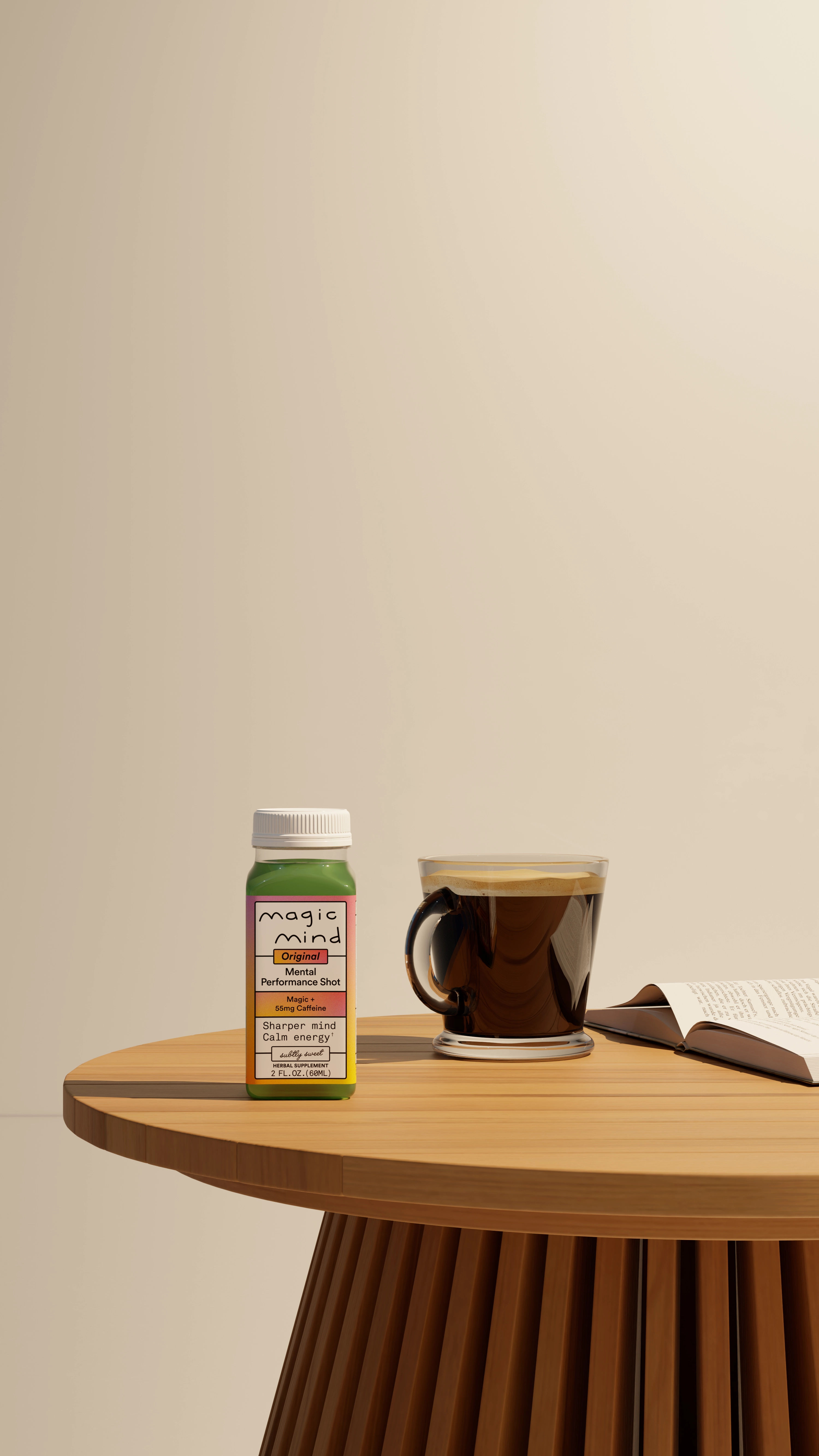 A small green bottle, coffee cup, and open book on a wooden table.