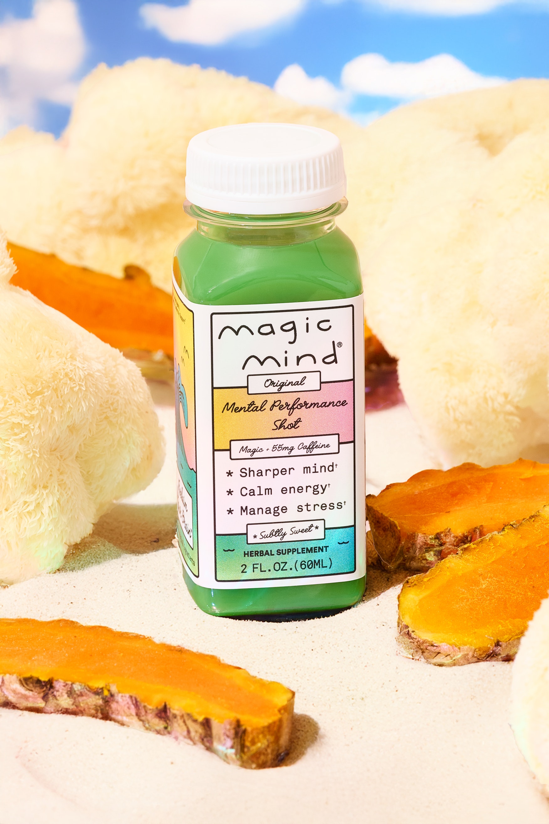 Green bottle labeled 'Magic Mind' surrounded by turmeric slices and fluffy objects.