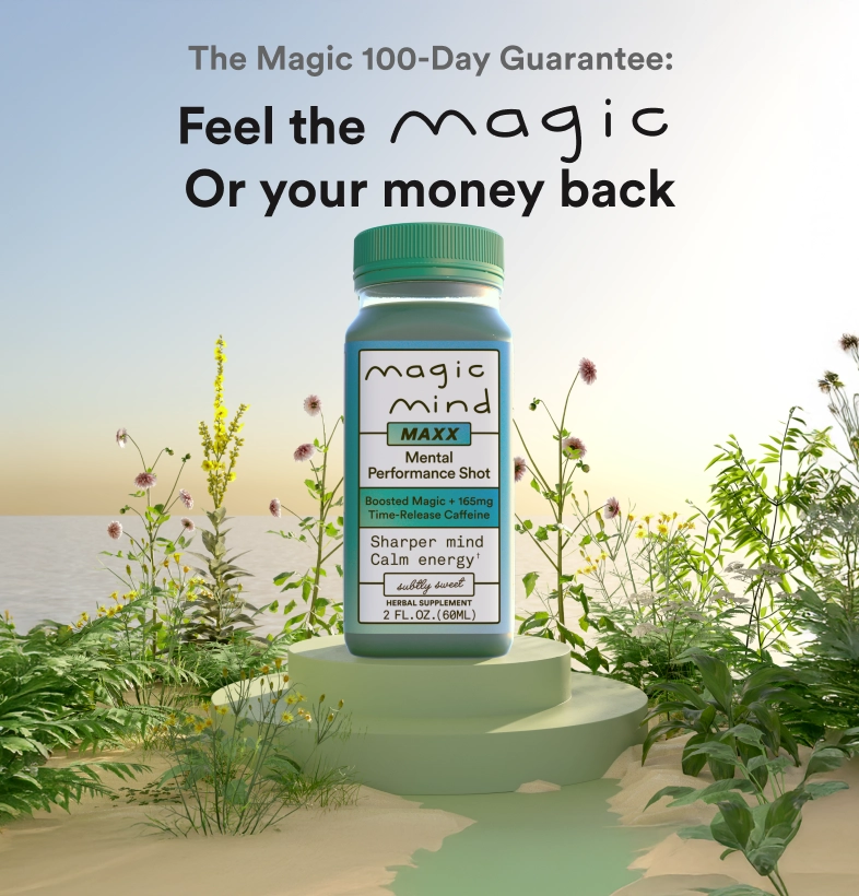 Bottle of Magic Mind supplement on a sand and plant background.
