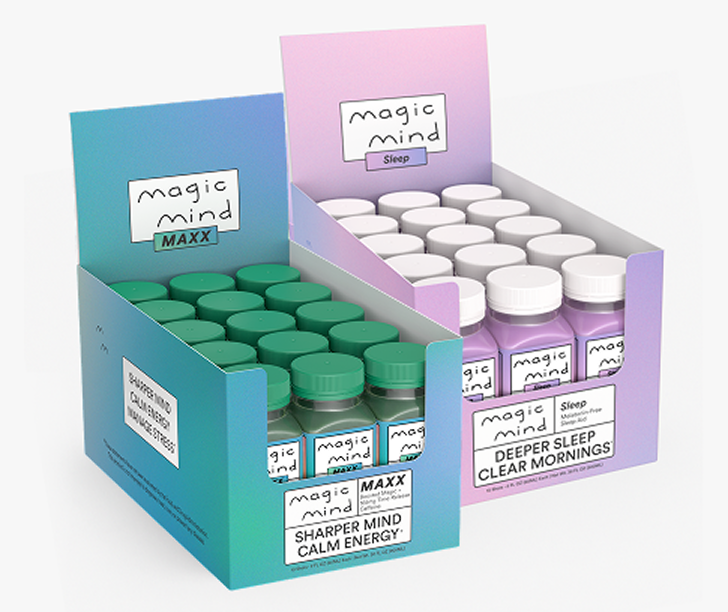 Two boxes of Magic Mind supplements with green and purple bottles.