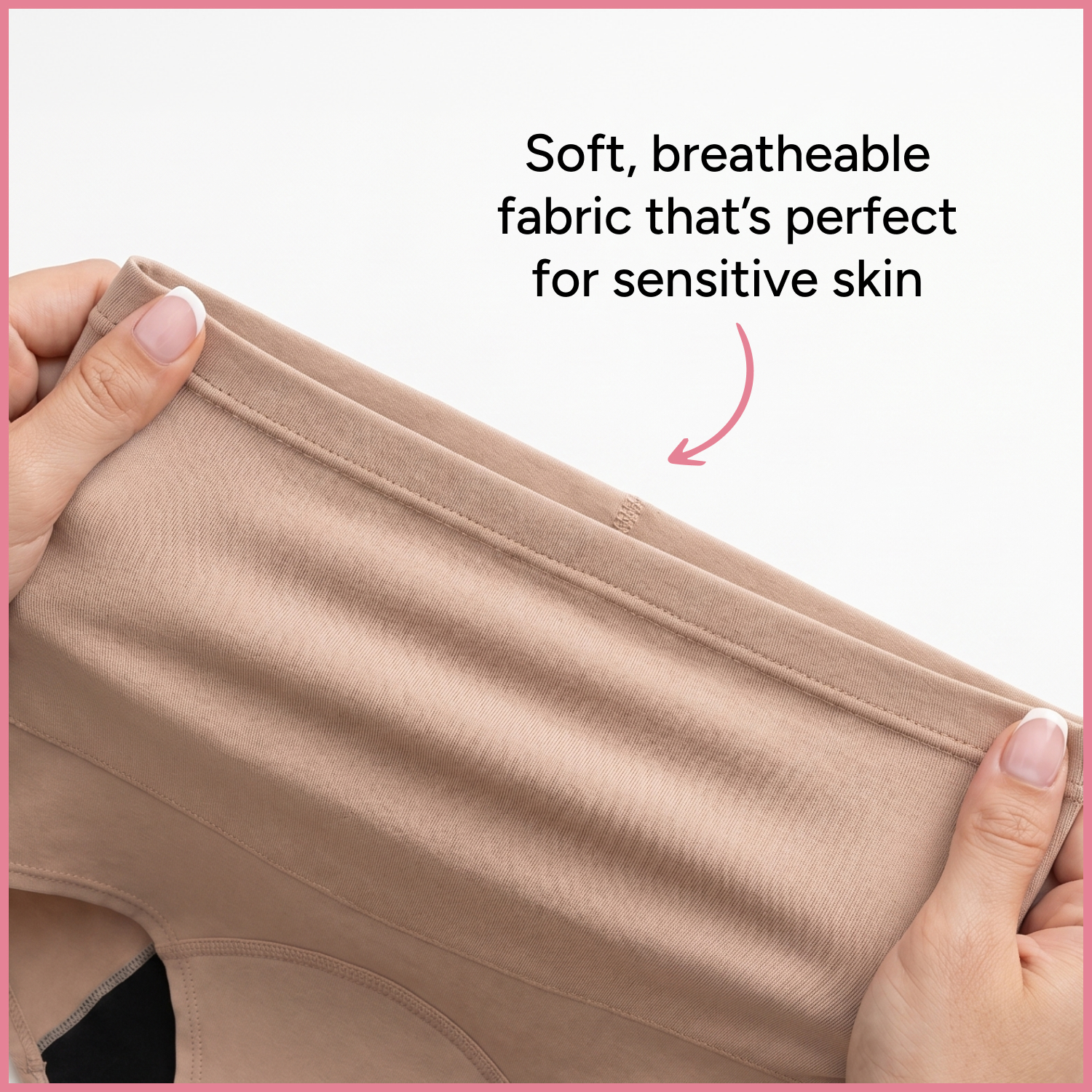A close-up of hands stretching the soft, tan fabric of a pair of underwear.
