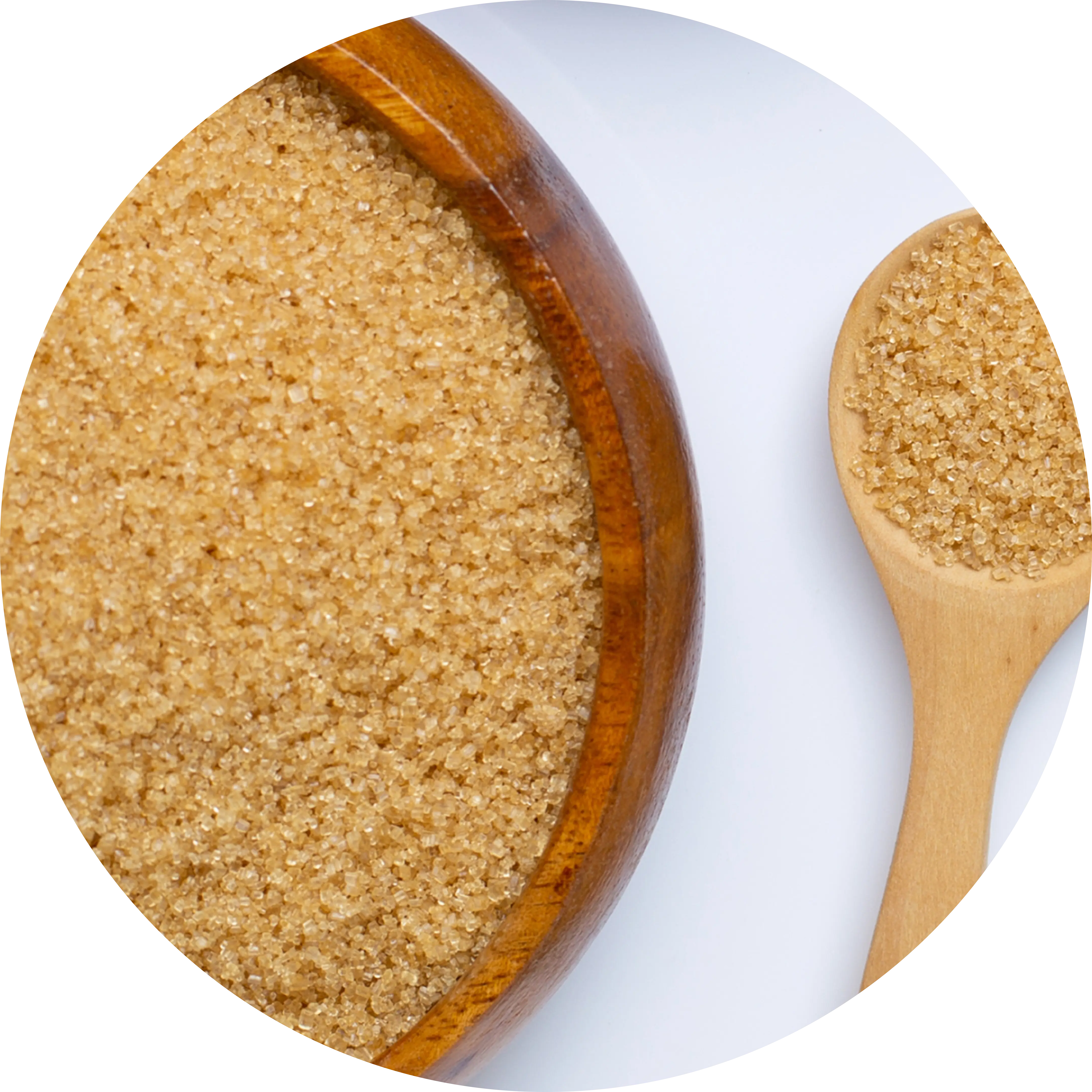 Brown sugar in a wooden bowl with a wooden spoon.