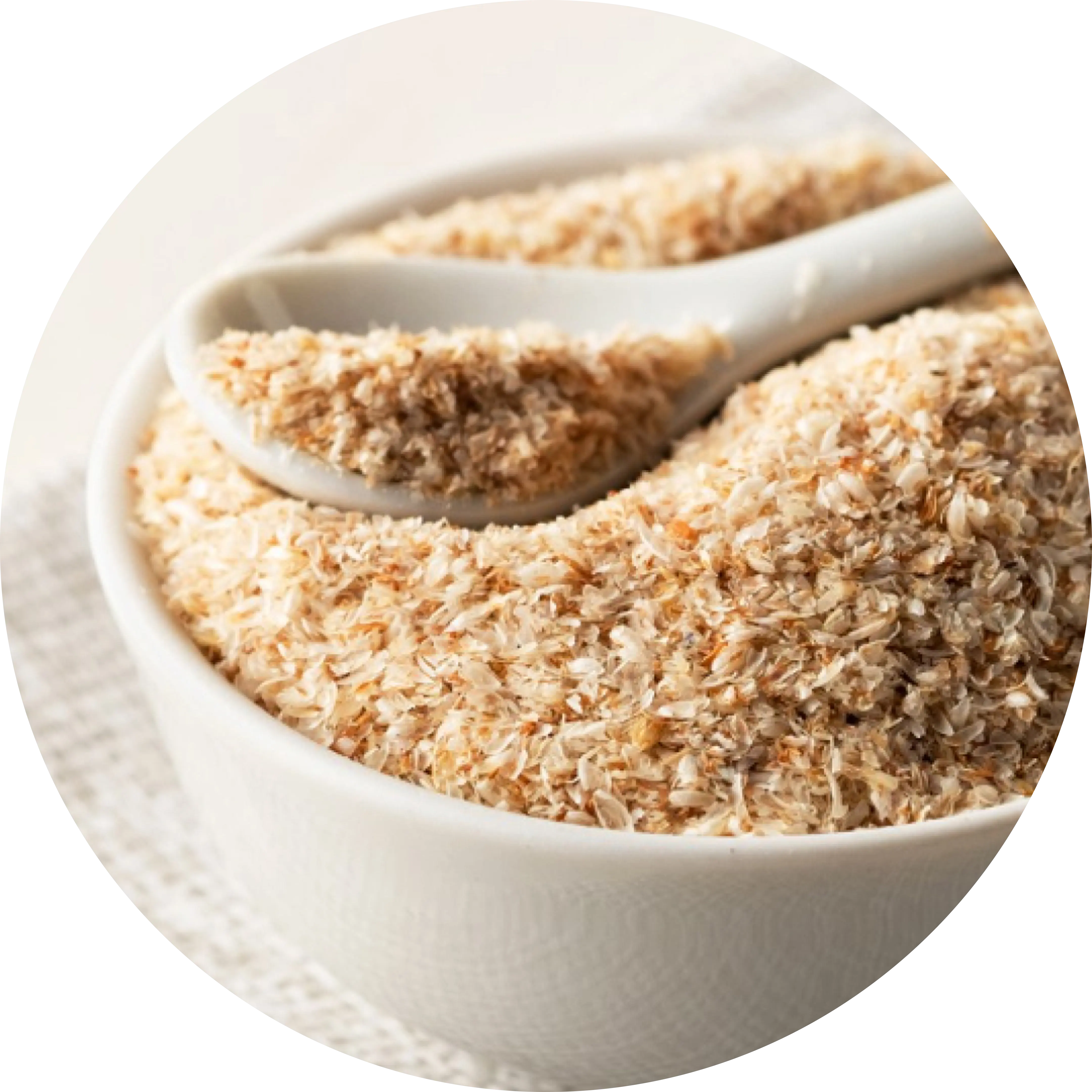 A bowl of psyllium husk with a ceramic spoon.