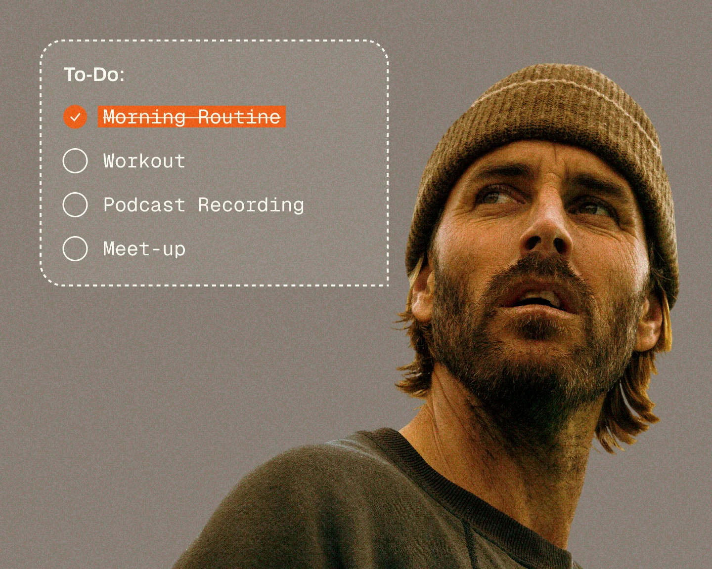 A man in a brown beanie looks away from a to-do list with 'Morning Routine' checked off.