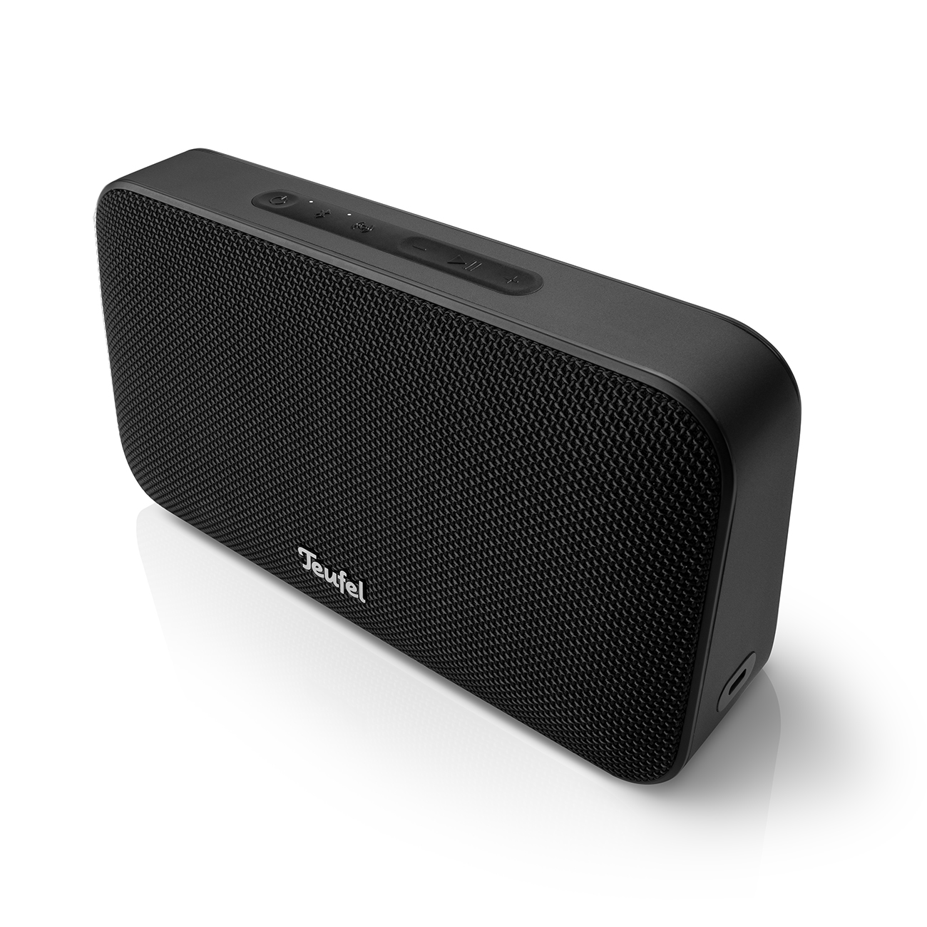 A black, rectangular Teufel portable speaker with top controls, shown at an angle on a white background.