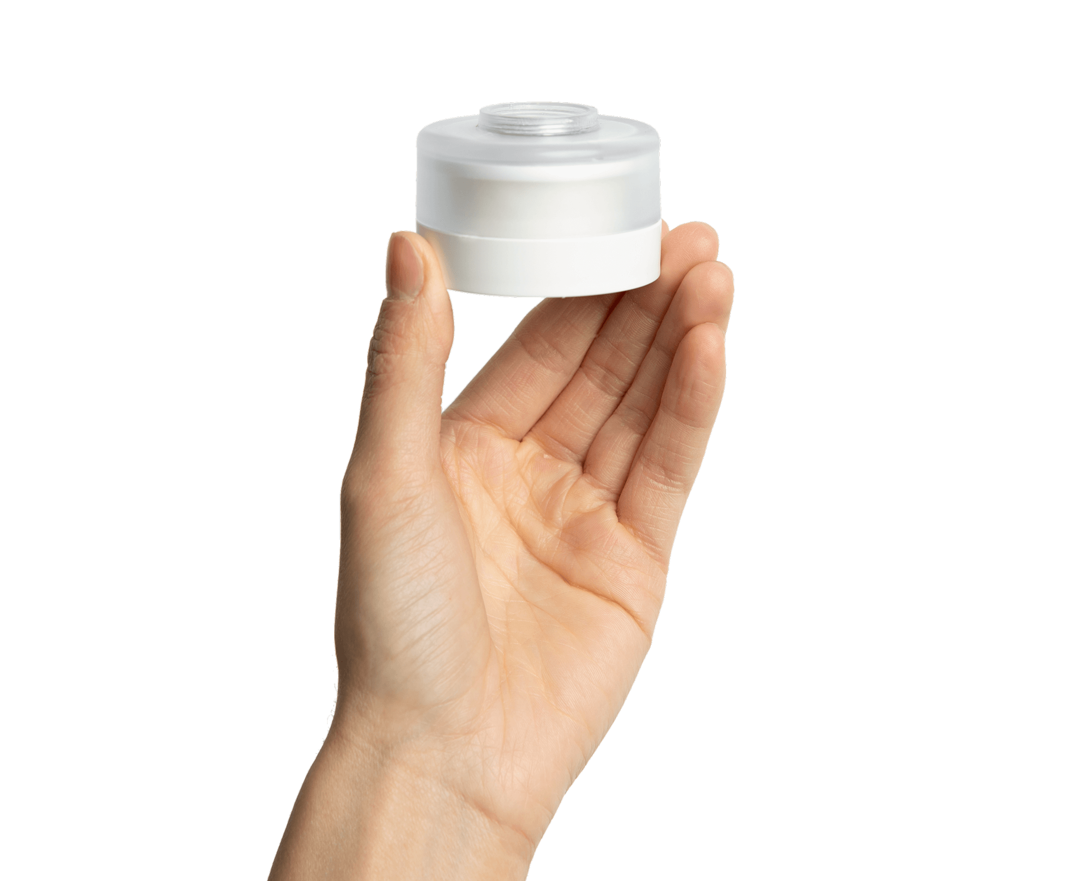Hand holding a small, white plastic container cap.