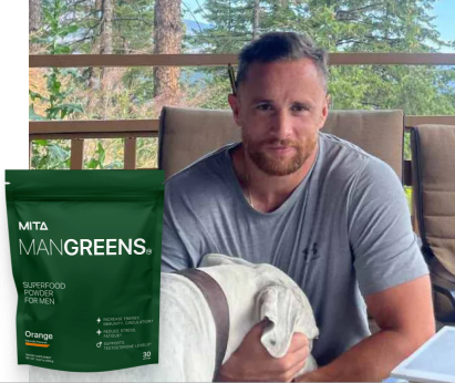 Man sitting outdoors with a bag of ManGreens superfood powder.