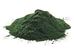 A pile of green powder on a white background.