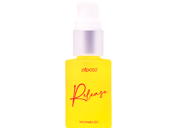 Yellow bottle of intimate oil with a pump dispenser.