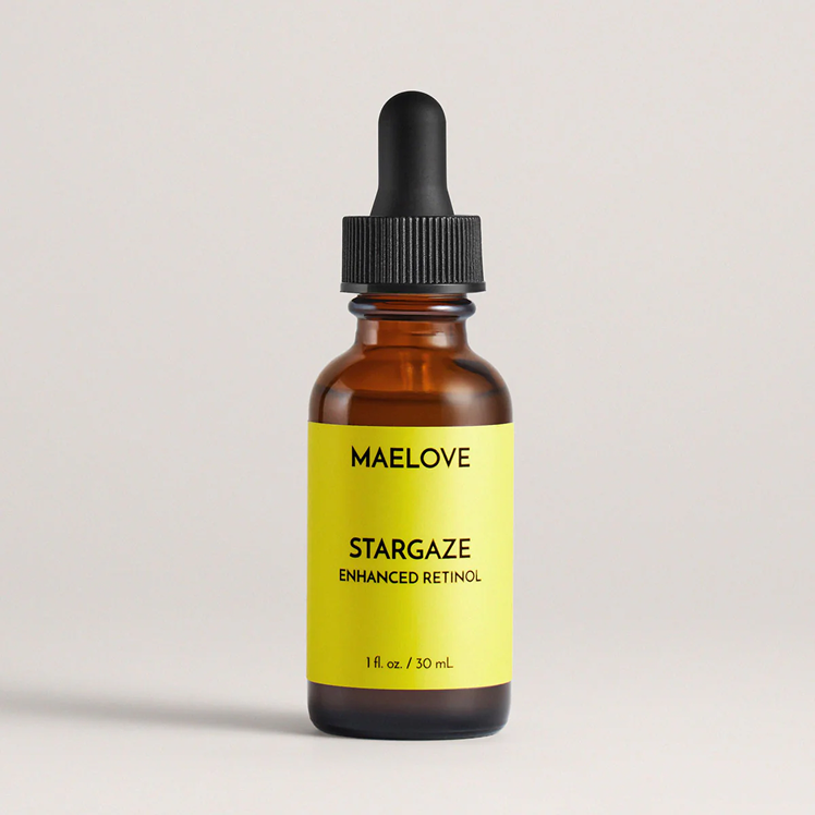 Brown dropper bottle labeled 'Maelove Stargaze Enhanced Retinol' on a plain background.