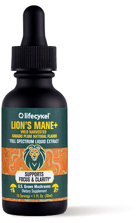 A bottle labeled 'Lion's Mane+' with dropper cap, promoting focus and clarity.
