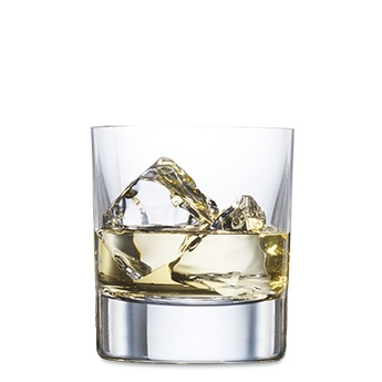 Glass of whiskey with ice cubes on a white background.