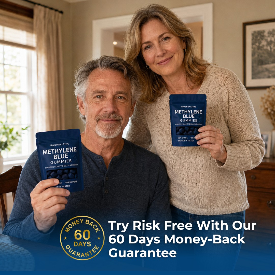 A man and woman smile while each holds a pouch of Methylene Blue Gummies supplement.