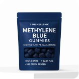 A blue pouch of TJSHealthic Methylene Blue Gummies, showing the dark blue gummies through a clear window.