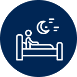 An icon of a person sitting up in bed at night with a crescent moon above.