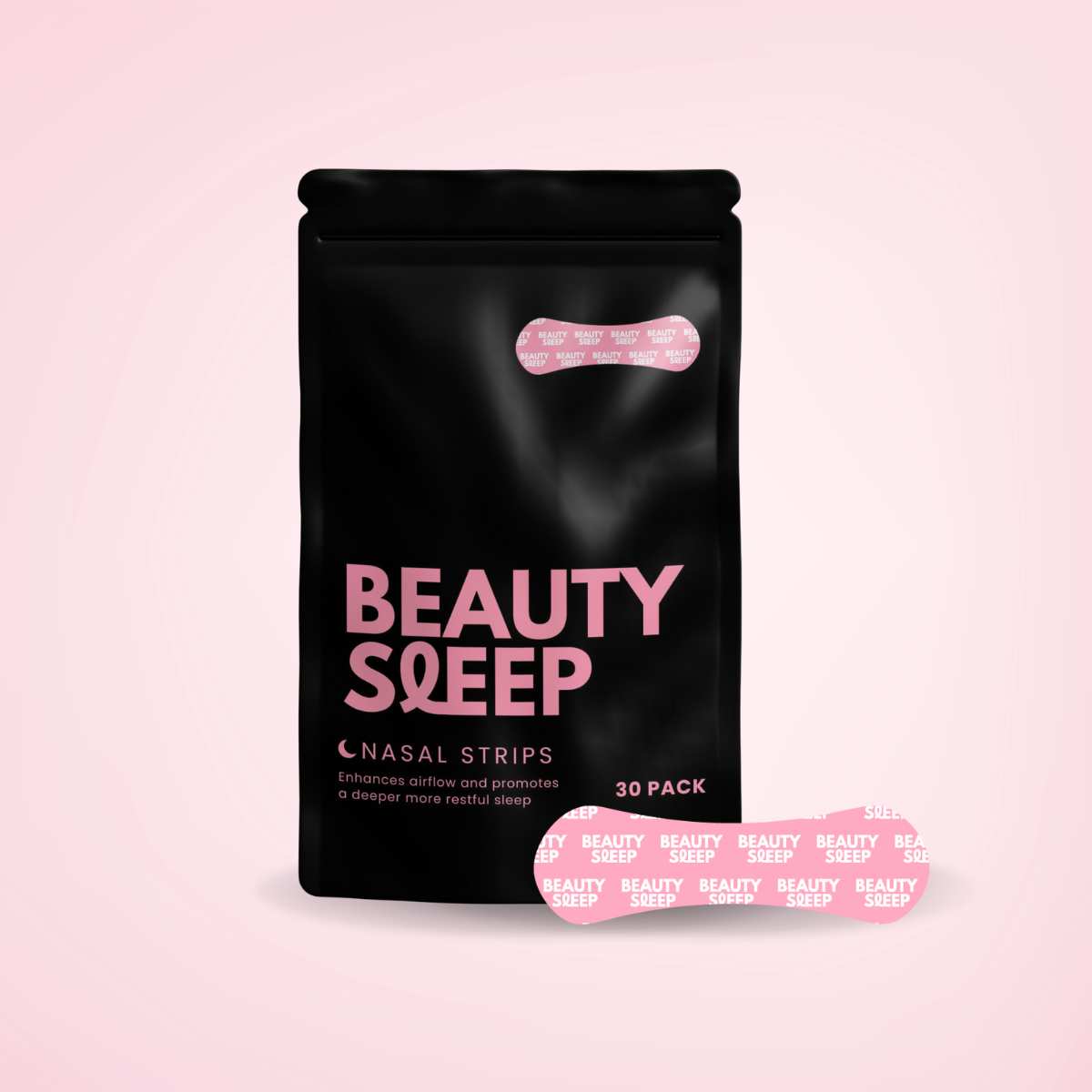 Black package labeled 'Beauty Sleep' with capsules beside it.