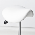 White saddle-style stool with a metal base.