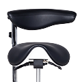 Black ergonomic saddle chair with backrest on a metal stand.