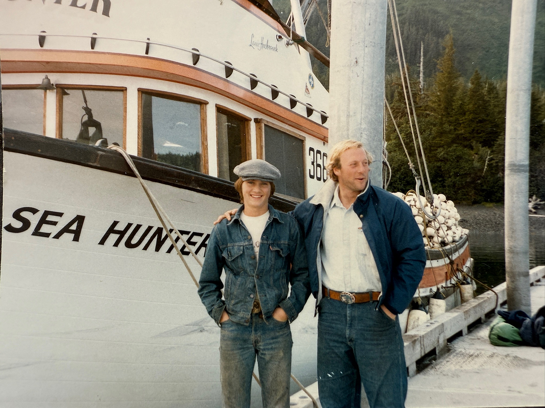 2 people near fishing boat