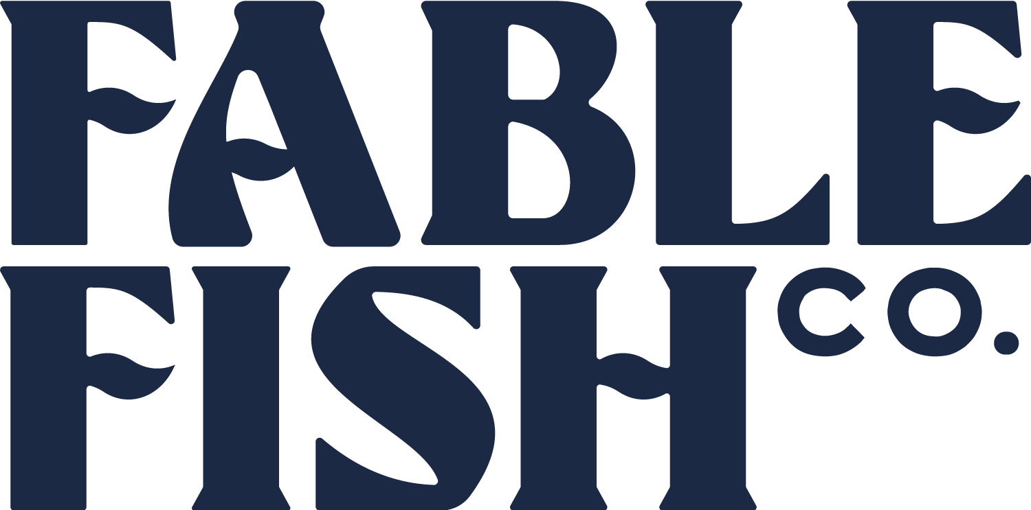 Logo with text 'Fable Fish Co.' in dark blue.