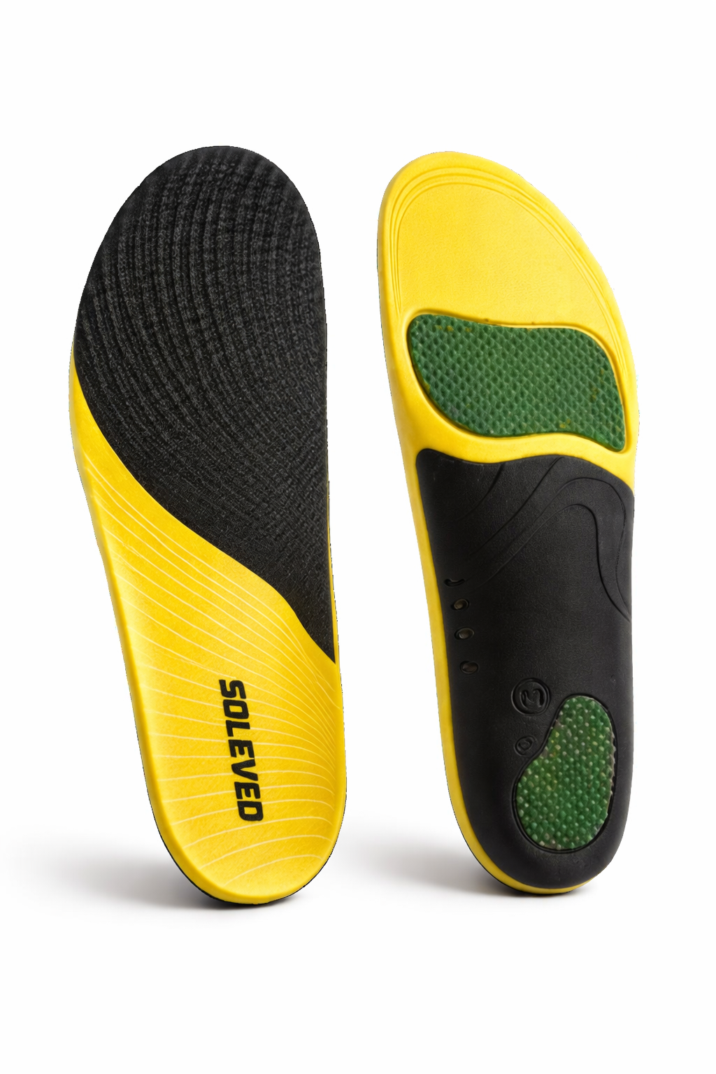 The top and bottom of a pair of yellow, black, and green shoe insoles on a white background.