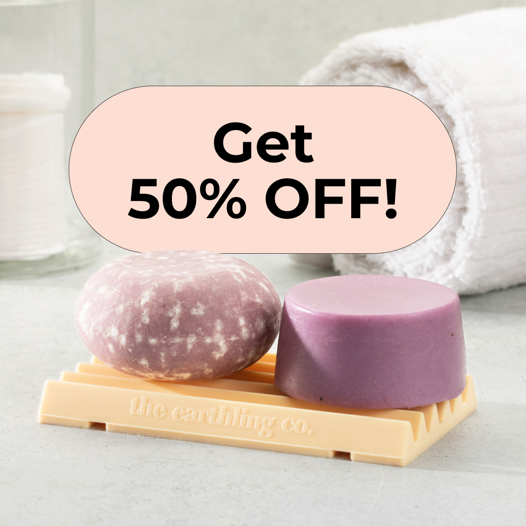 Two purple soap bars sit on a soap dish with a text overlay reading 'Get 50% OFF!'