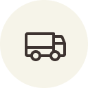 Simple truck icon on a beige circular background.