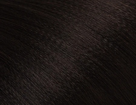 Close-up of dark brown hair texture.