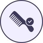 Icon of a comb with a checkmark inside a circle.