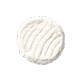 A round, fluffy white cleaning pad on a black background.